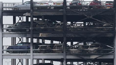 Fire tears through a parking garage at London’s Luton Airport, and 5 people have been hospitalized